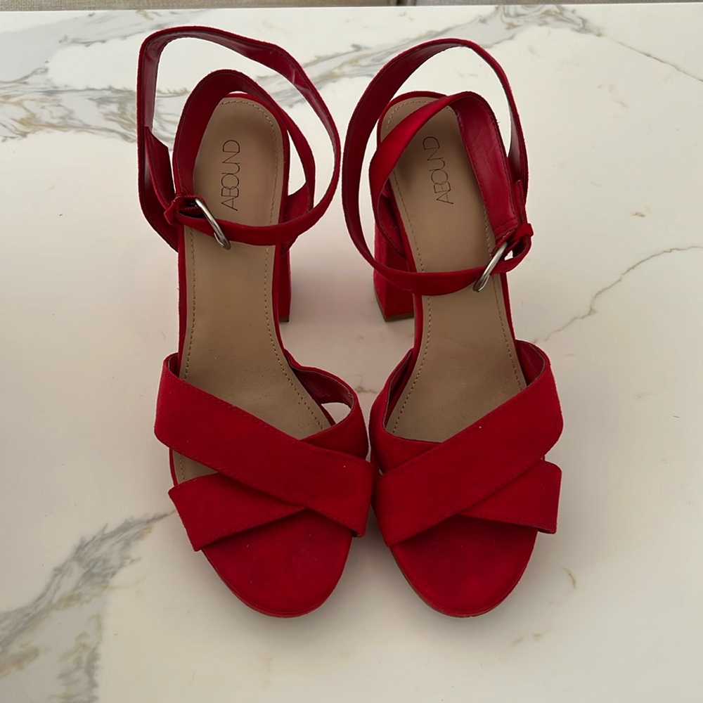 Bright red abound, strappy platform heel